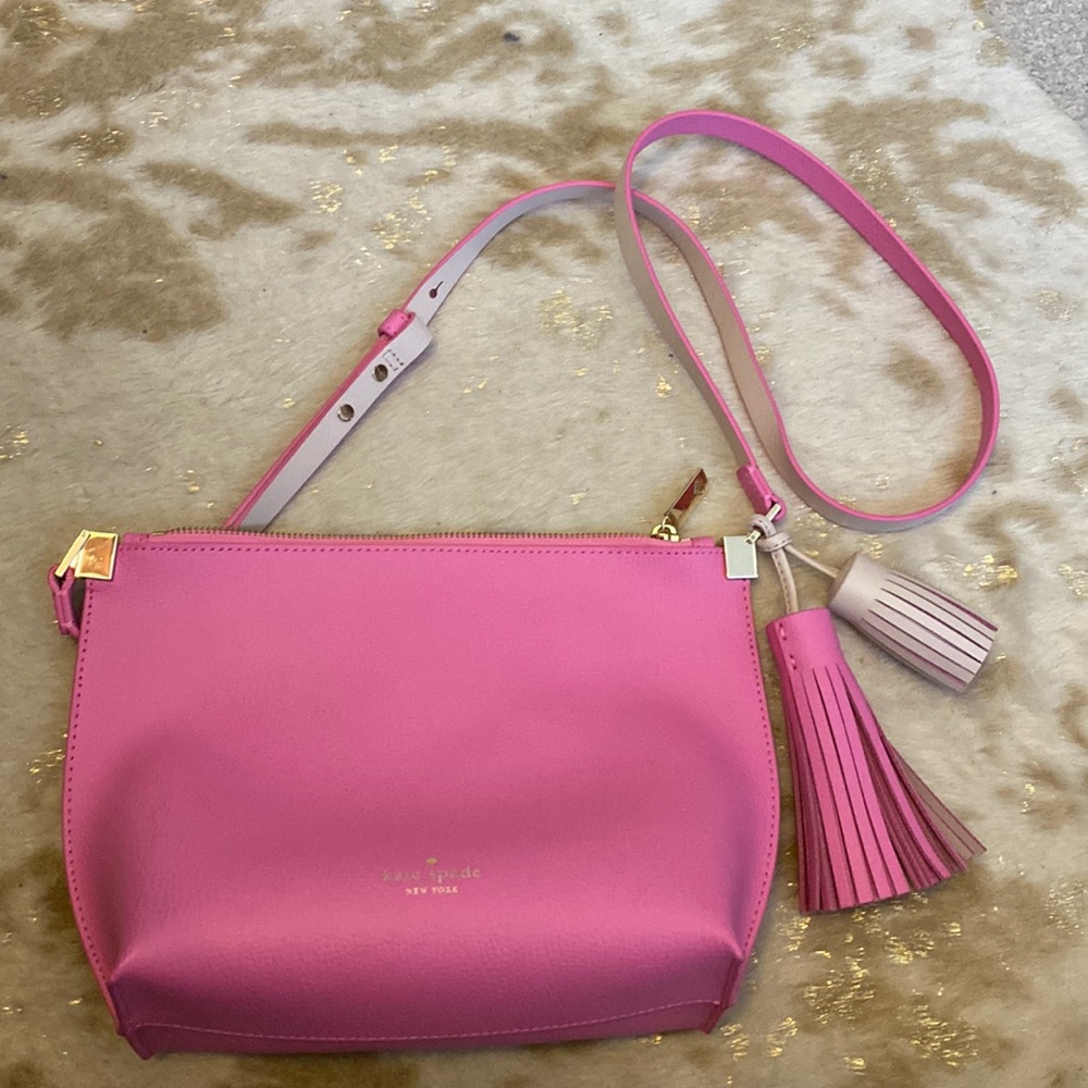 Kate Spade Pink leather with tassels and gold emblessment